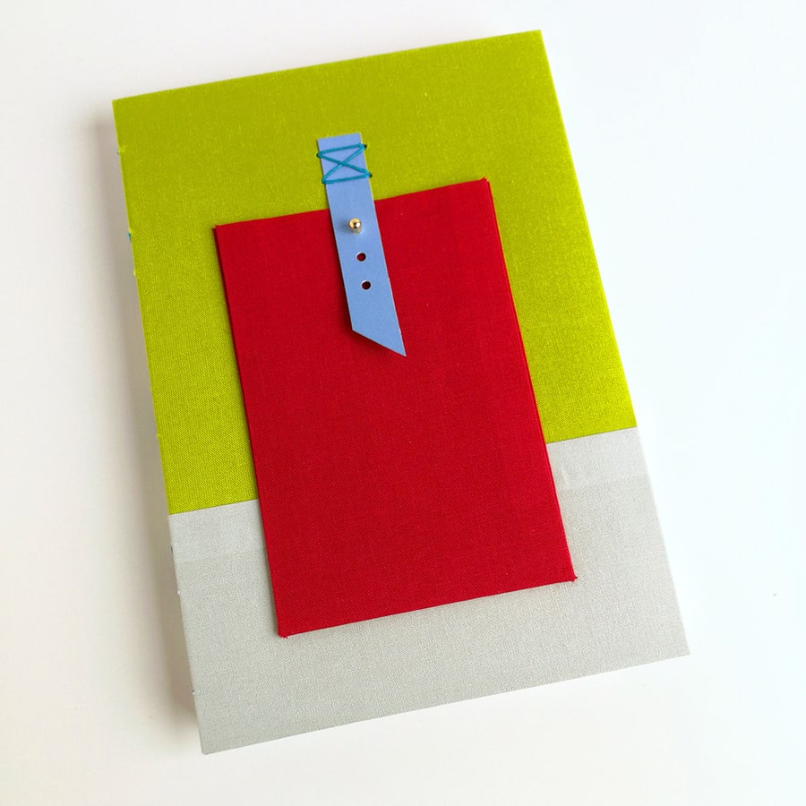 cuaderno mochila verde lima gris